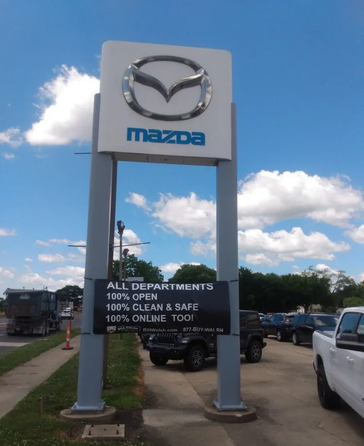 Slide of J & S Electric and Sign