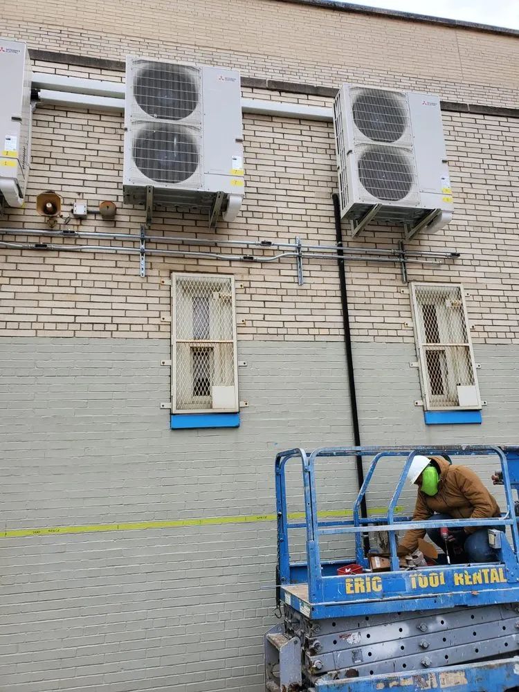 Slide of J H I Electric