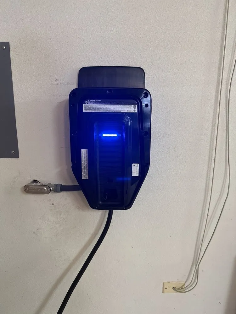 Professional electrician providing emergency electrical service in , 