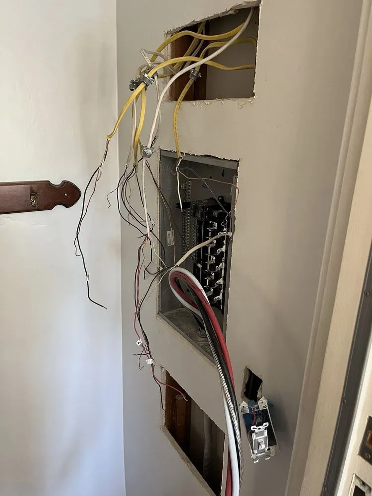 Professional electrician providing outlet and switch repair in , 