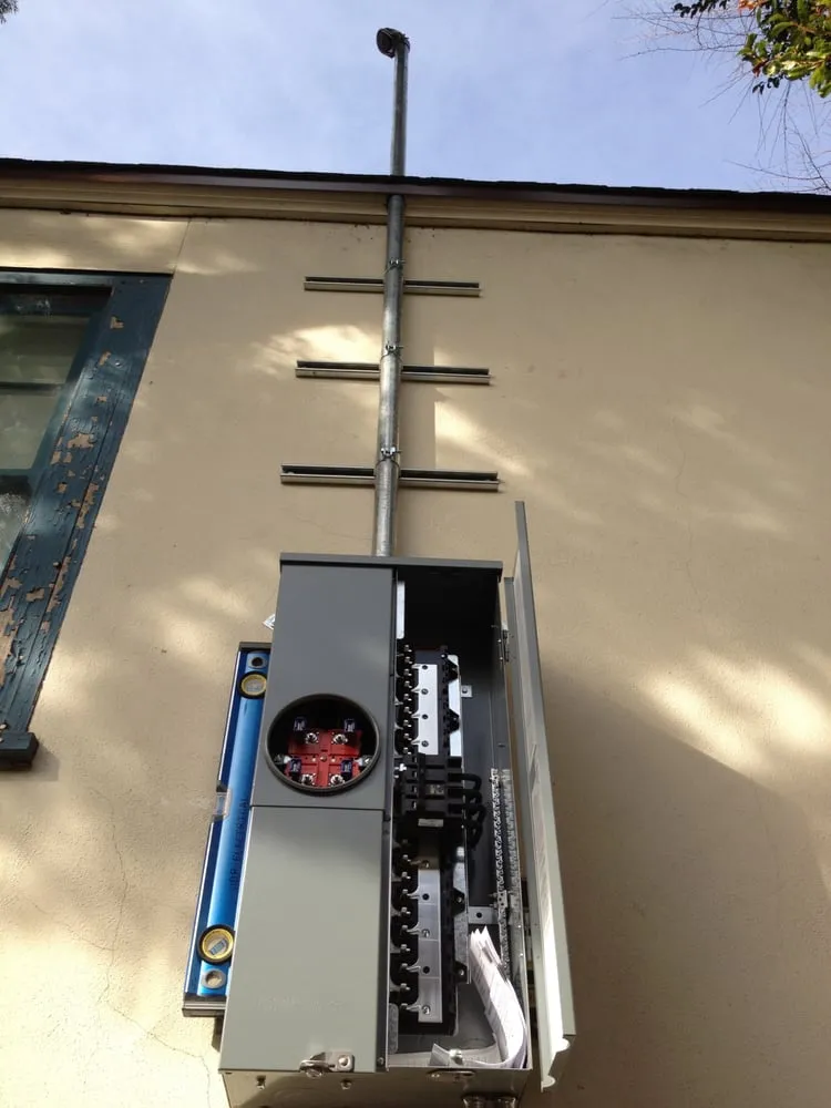 Certified electrician providing panel upgrade in , 