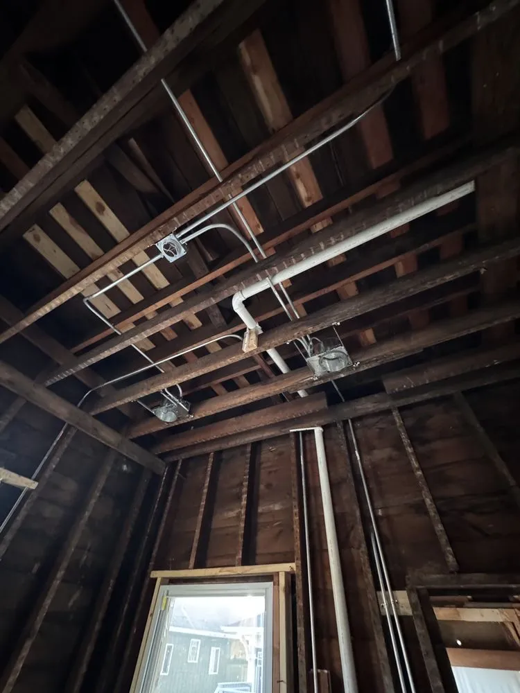 Professional electrician providing panel upgrade in , 