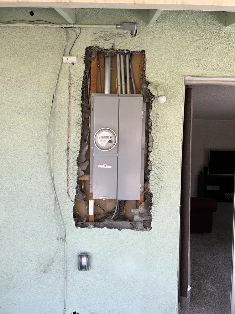 Slide of JMT Lighting and Electrical