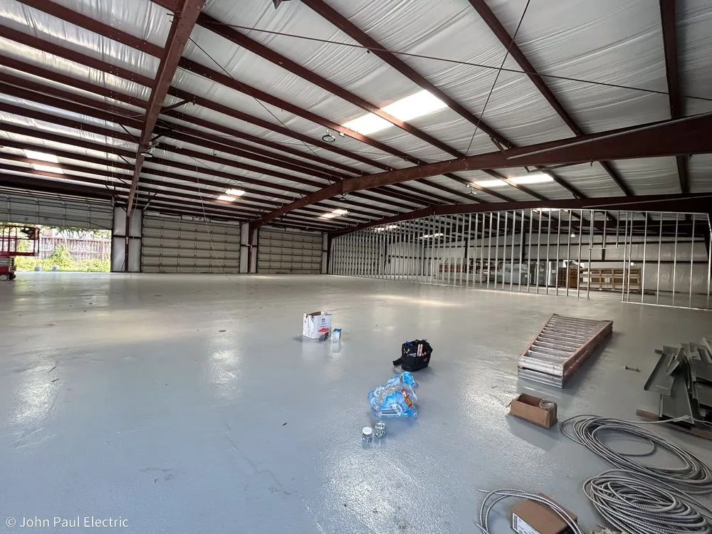 Slide of John Paul Electric