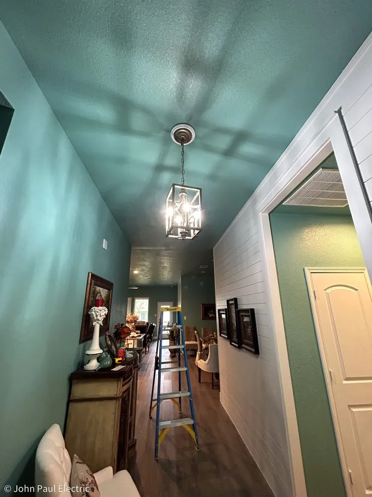 Slide of John Paul Electric