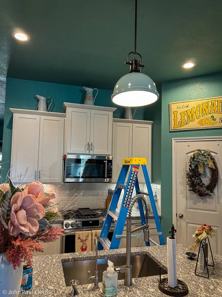 Slide of John Paul Electric