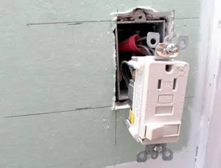 Slide of John Quigley Electric