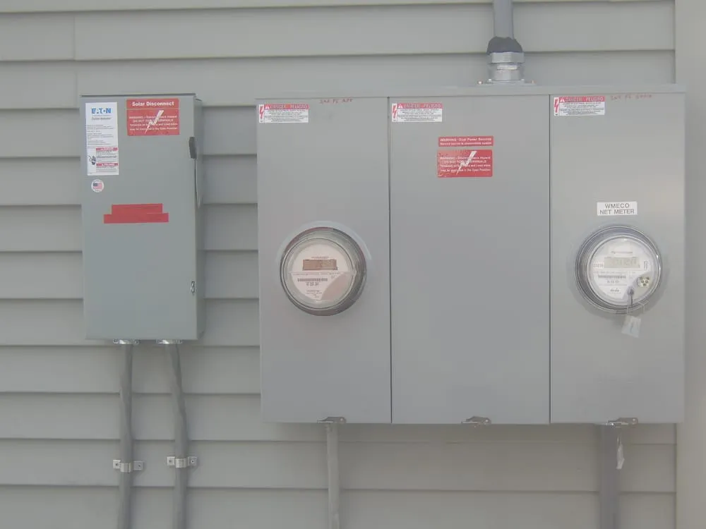 Professional electrician providing outlet and switch repair in Florence, MA - John T. Bates