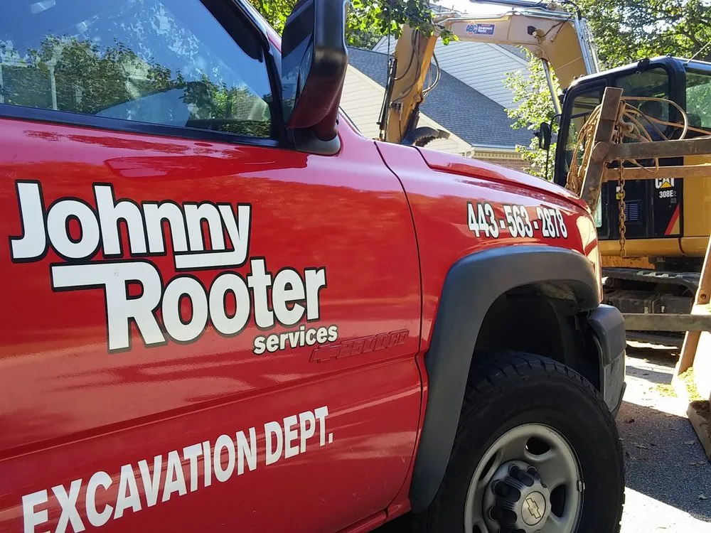 Slide of Johnny Rooter Services