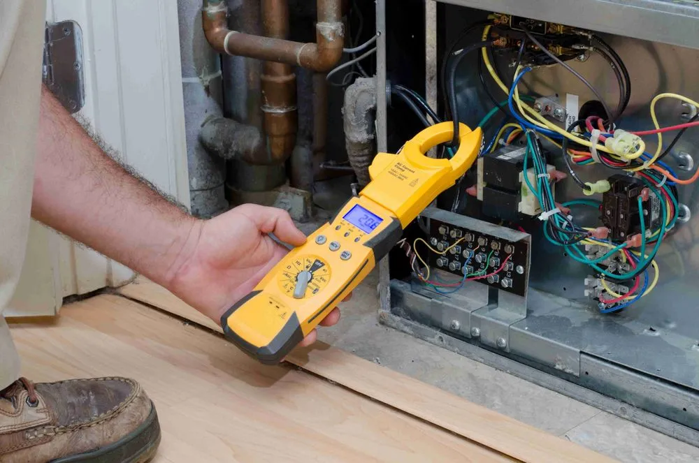 Professional electrician providing panel upgrade in , 