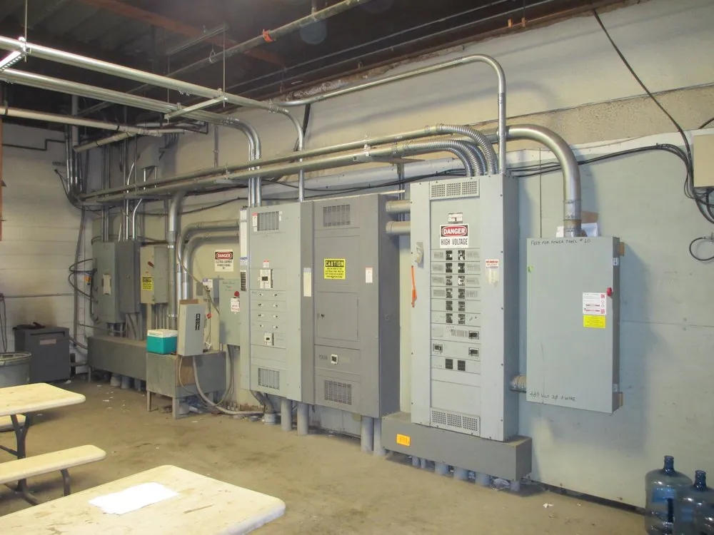 Licensed electrician providing panel upgrade in ,