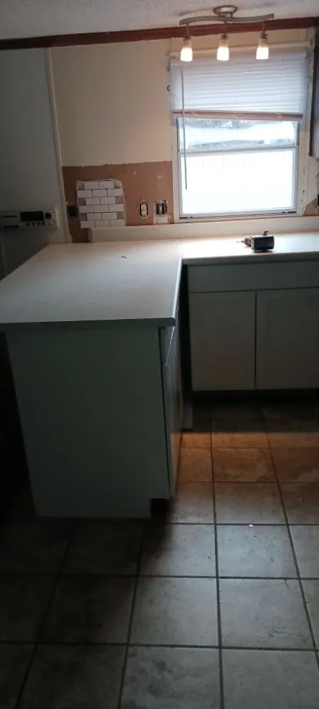 Slide of JT's Handyman