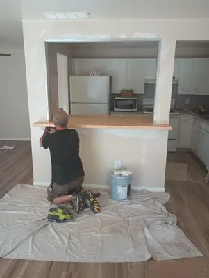 Kelly Johnson's Handyman Service Logo