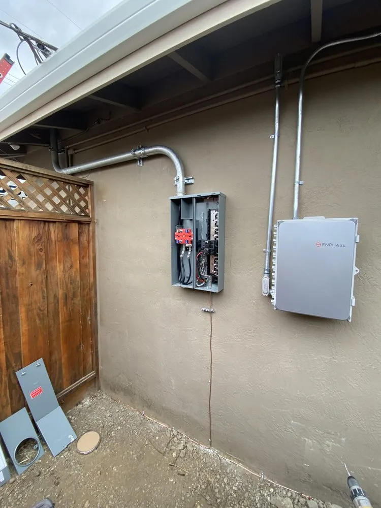 Professional electrician providing panel upgrade in ,