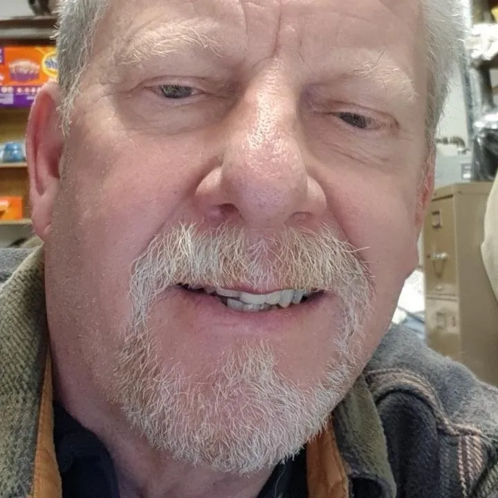 Slide of KJ's Custom Electric