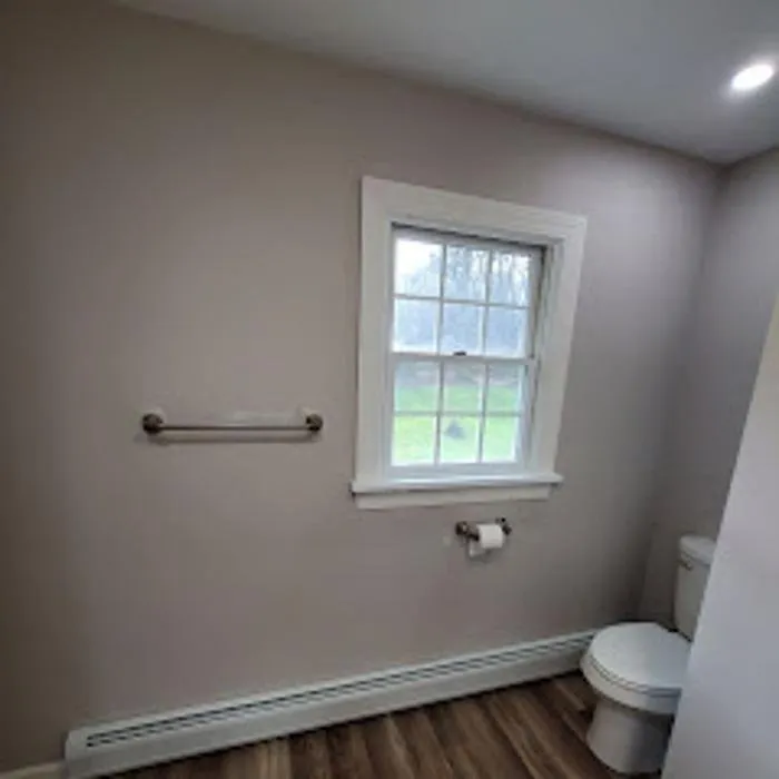 Expert electrician providing panel upgrade in , 