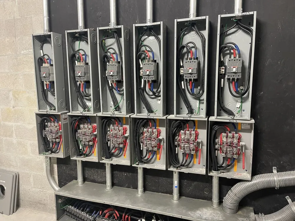 Professional electrician providing panel upgrade in , 