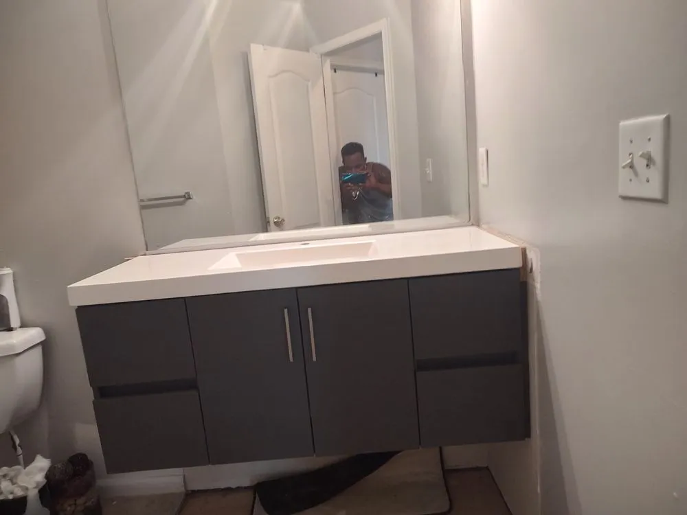 Slide of Leon Handyman