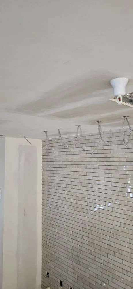 Slide of LI  Electric & Sons