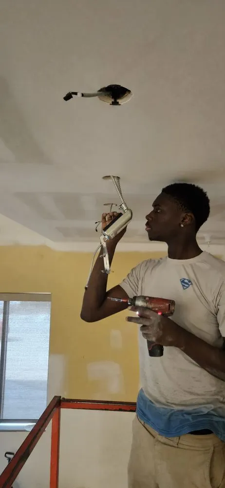 Slide of LI  Electric & Sons