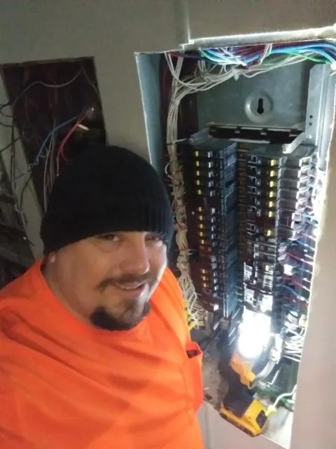 Professional electrician providing circuit breaker repair in Cedar Hill, TX - Light Em' Up Electric