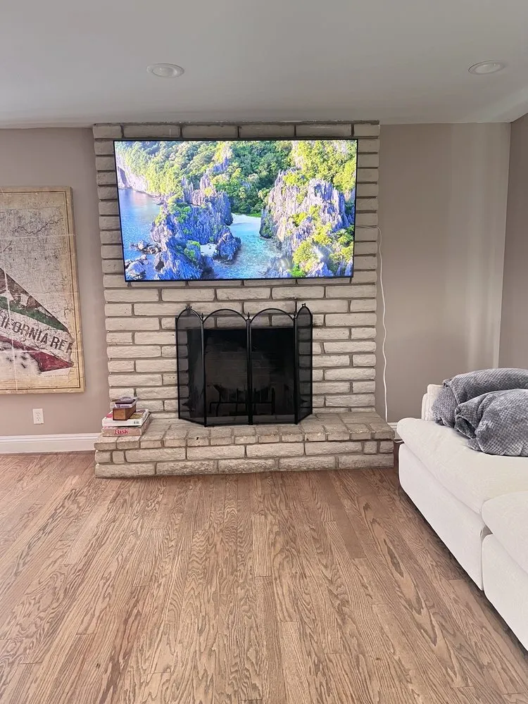 Slide of Live Wire Custom Wiring & Tv Mounting