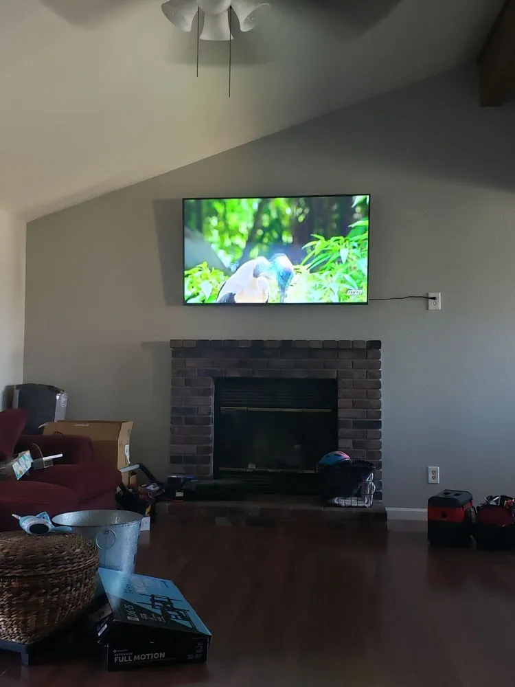 Slide of Live Wire Custom Wiring & Tv Mounting