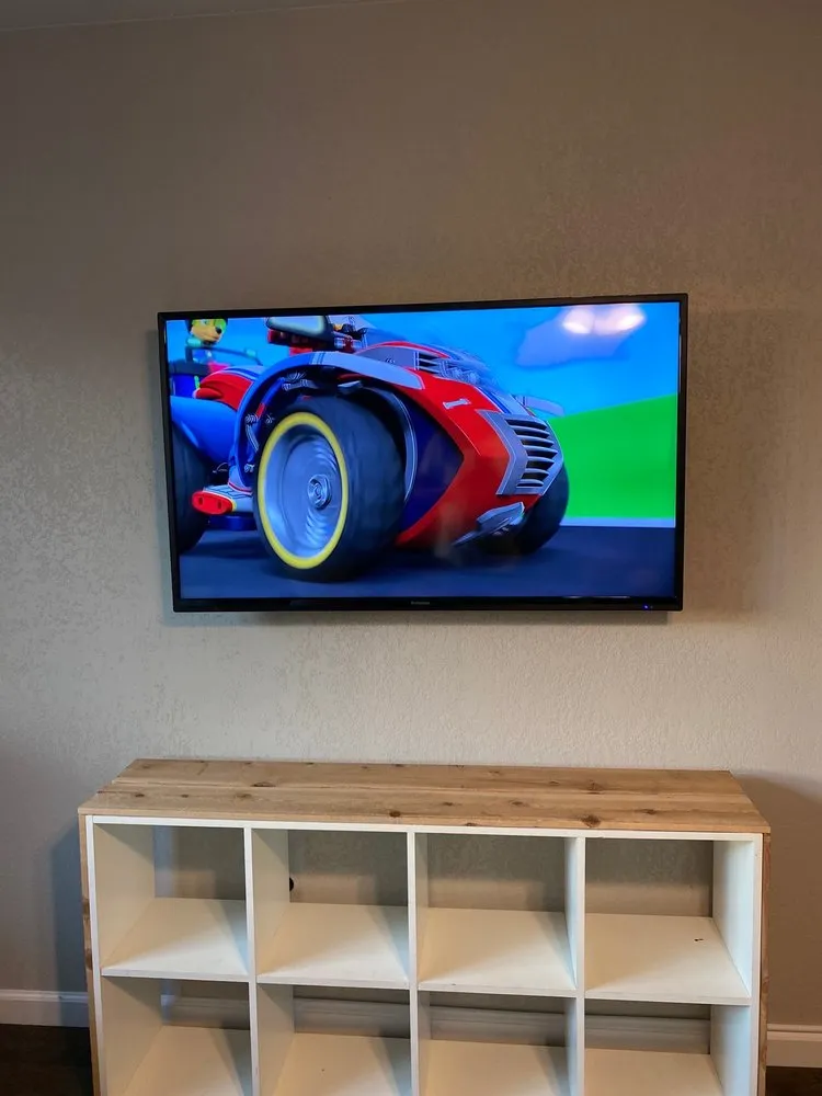 Slide of Live Wire Custom Wiring & Tv Mounting