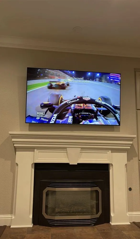 Slide of Live Wire Custom Wiring & Tv Mounting