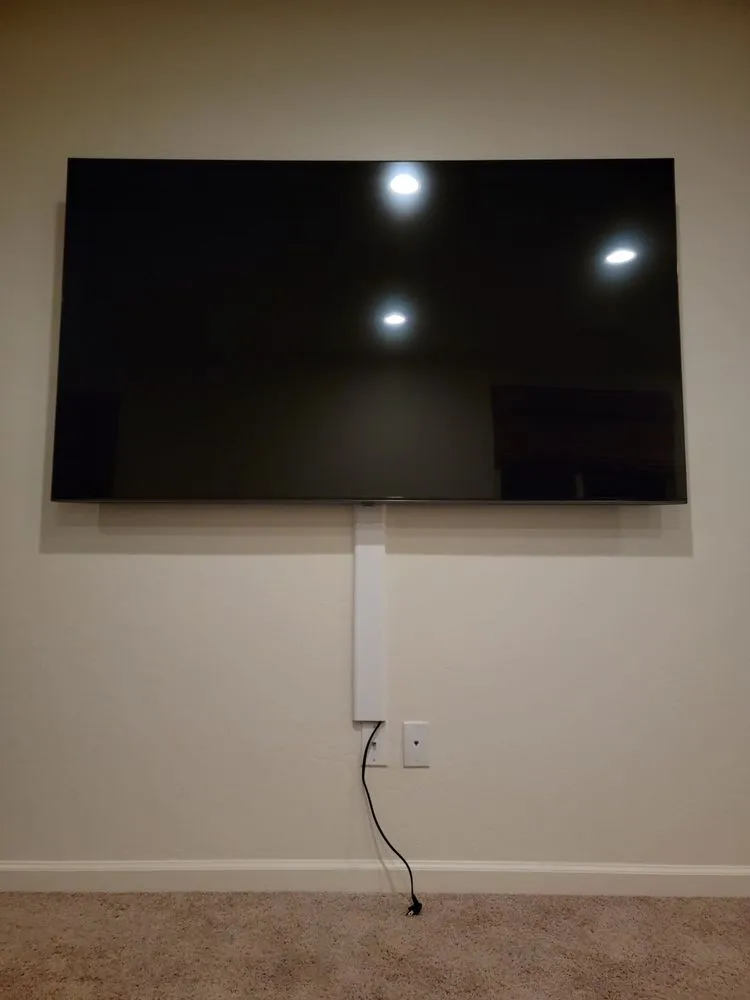 Slide of Live Wire Custom Wiring & Tv Mounting
