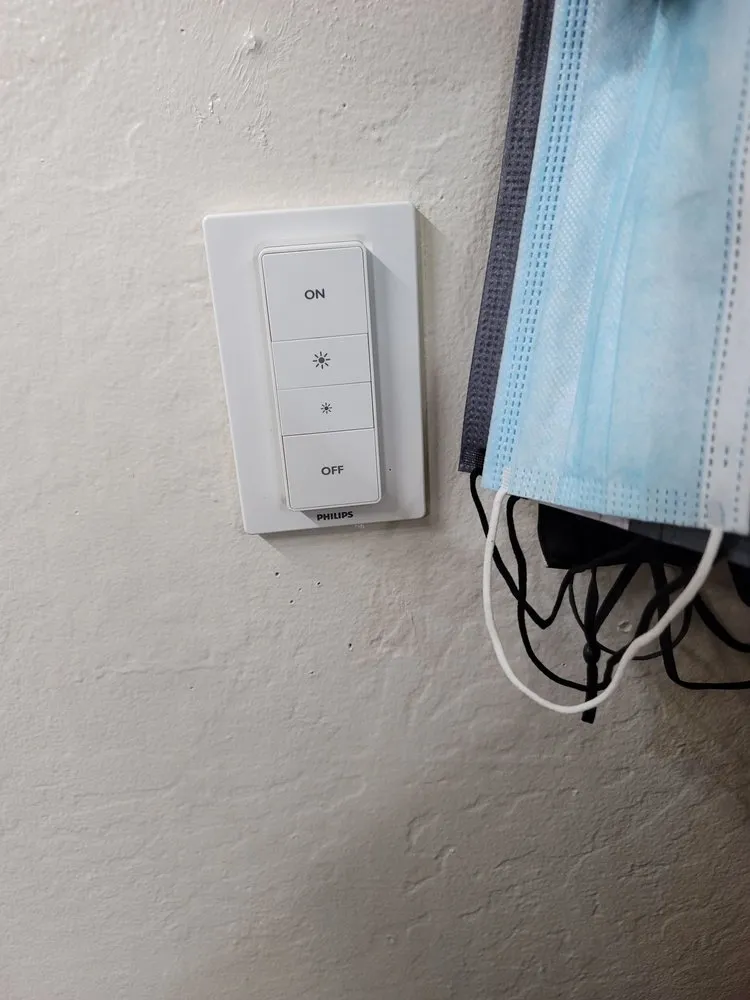 Licensed electrician providing outlet and switch repair in ,