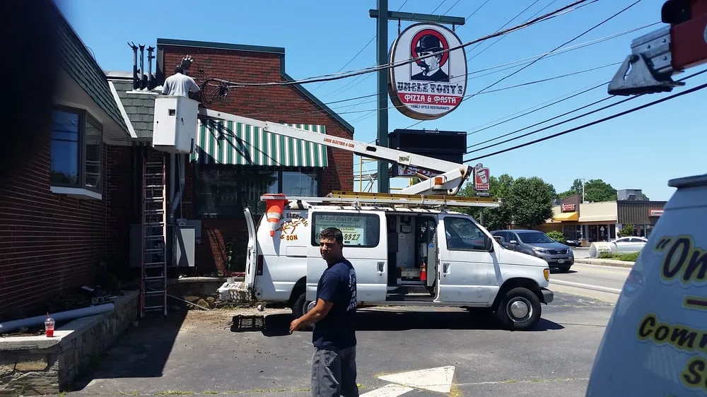 Slide of Louie Electric & Son