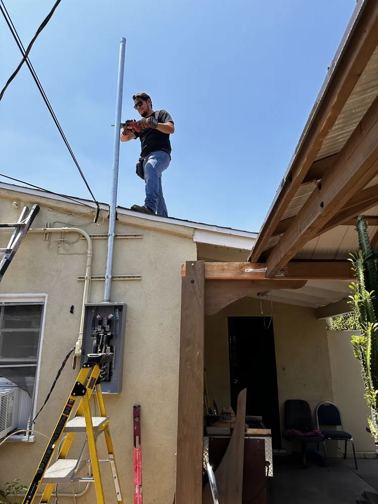 Professional electrician providing panel upgrade in ,