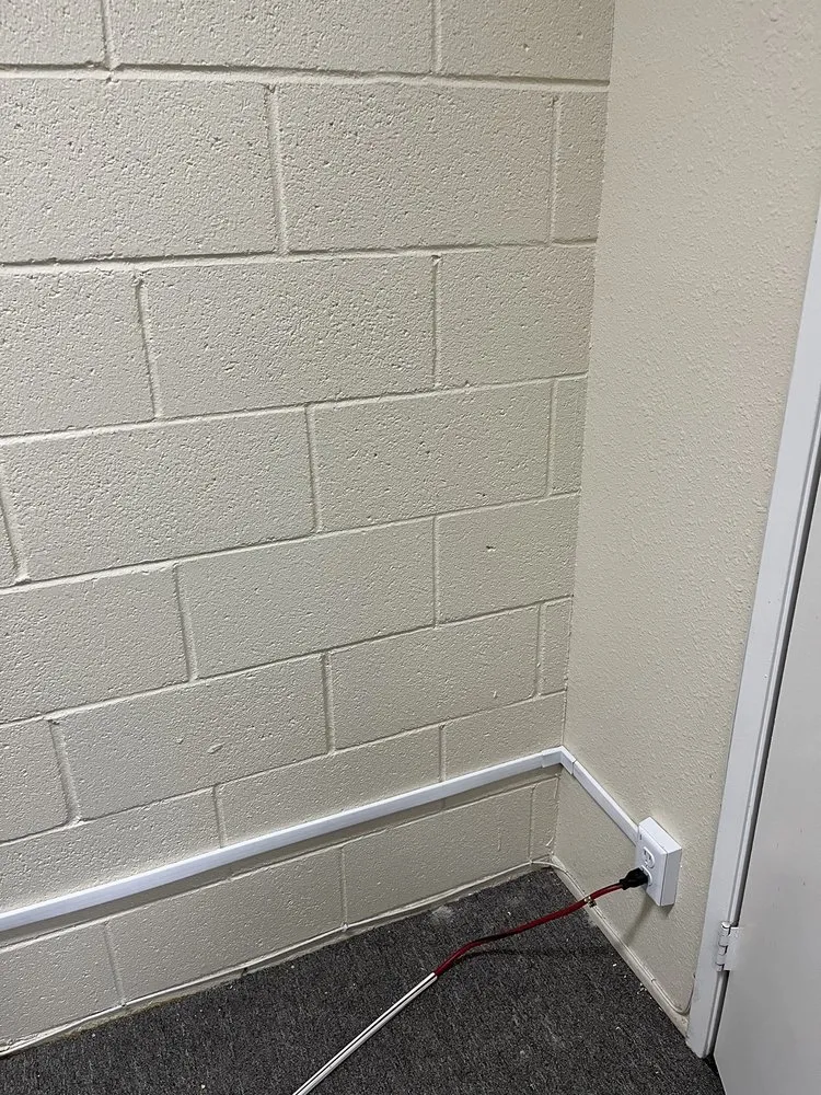 Professional electrician providing emergency electrical service in , 