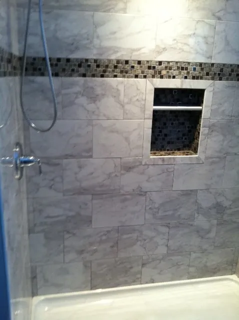 Professional electrician providing panel upgrade in Danbury, CT - M & R Kitchen and Bath Remodeling