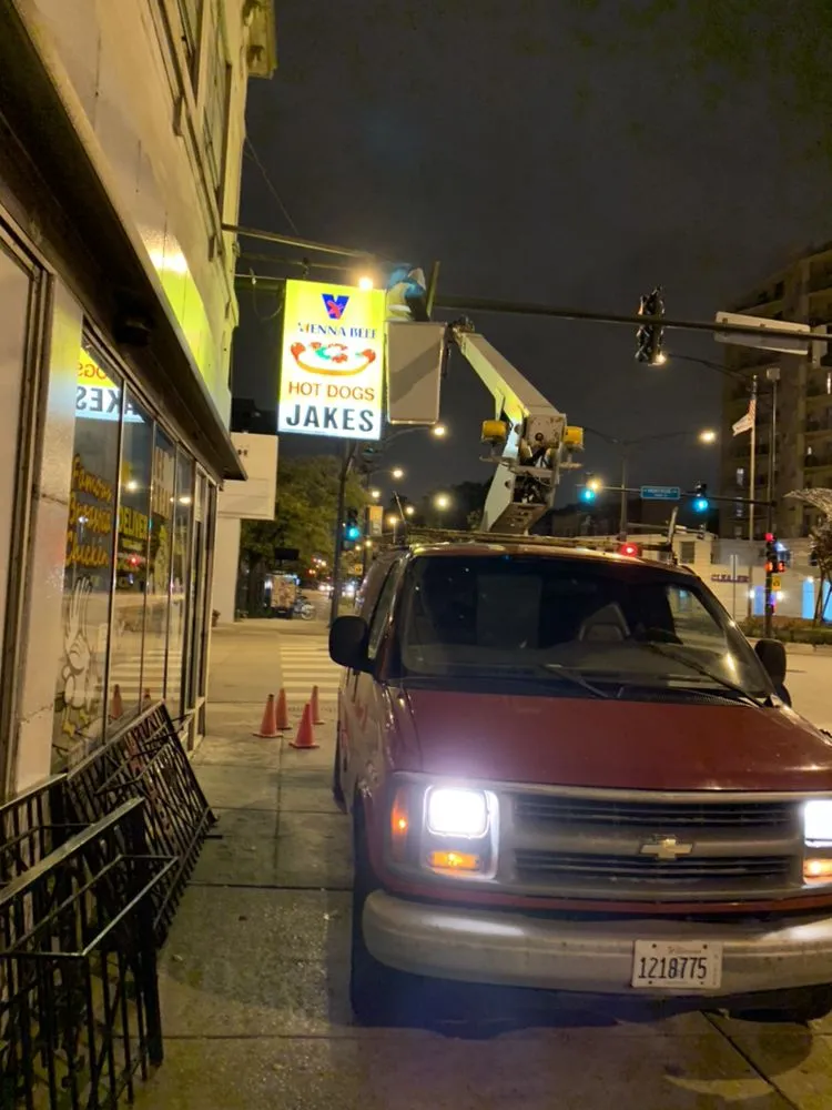 Slide of Malik Lighting & Signs Services