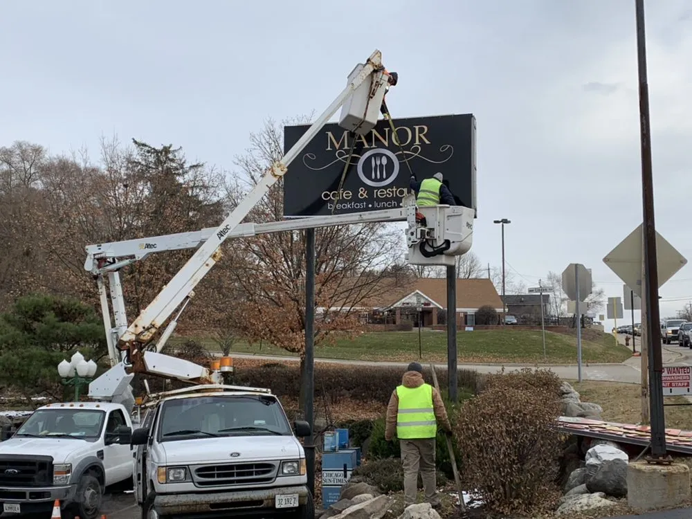 Slide of Malik Lighting & Signs Services