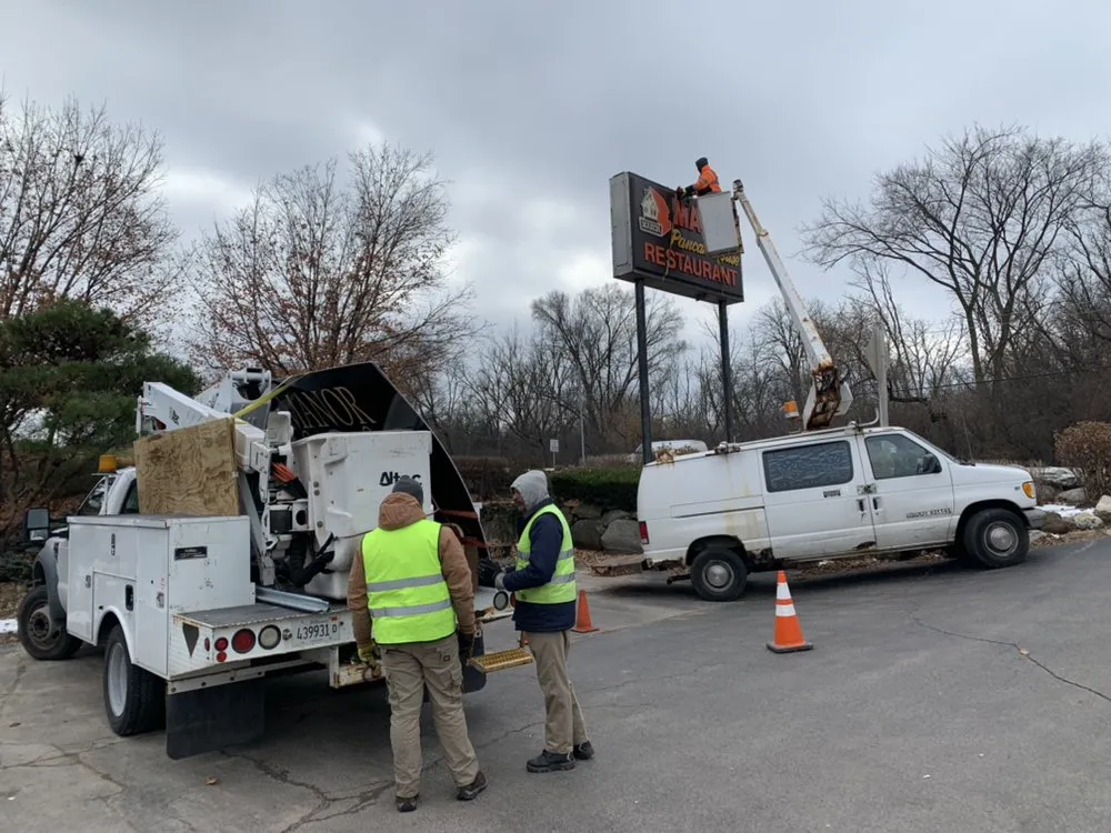 Slide of Malik Lighting & Signs Services