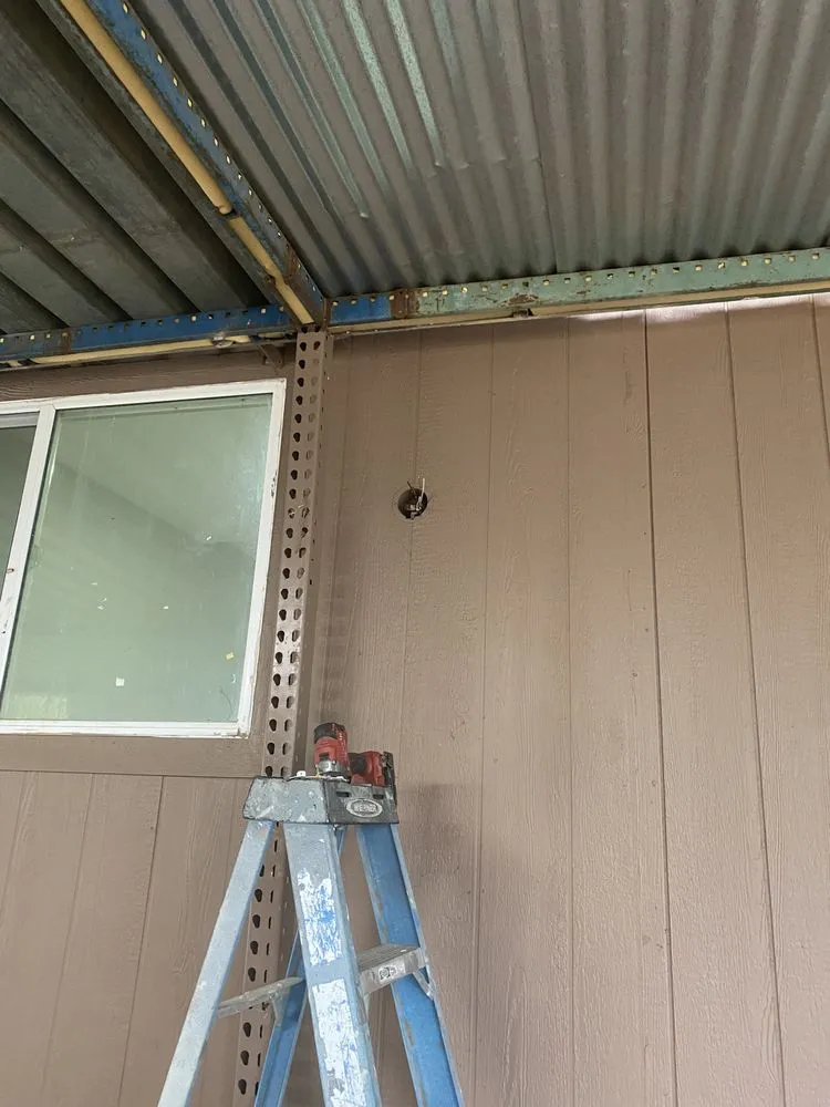 Slide of Manny's Electric