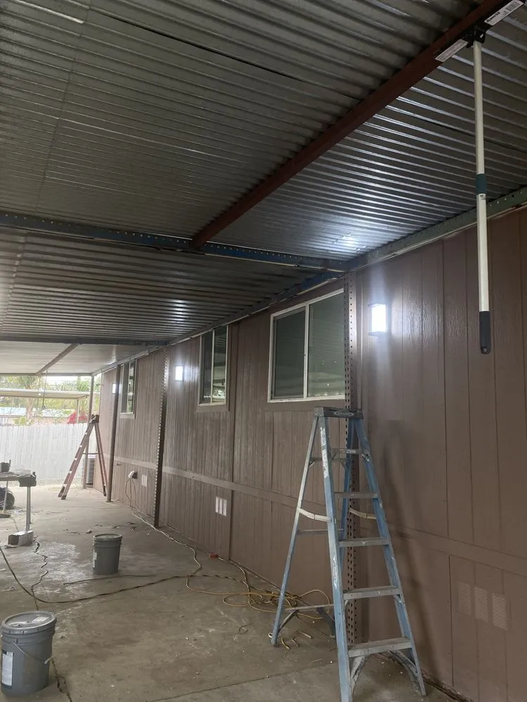 Slide of Manny's Electric