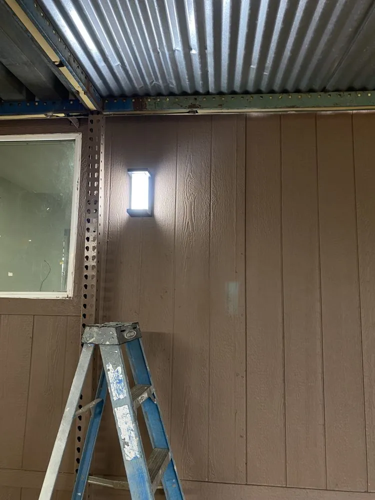 Slide of Manny's Electric