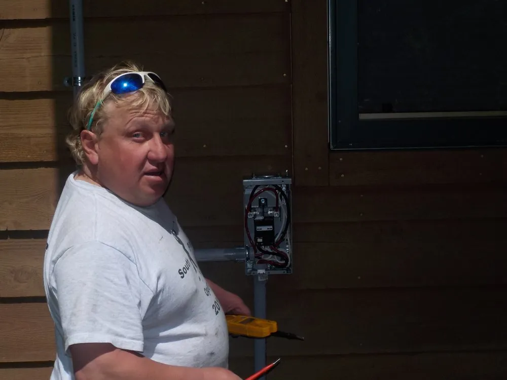 Slide of Mark Kelly Electric