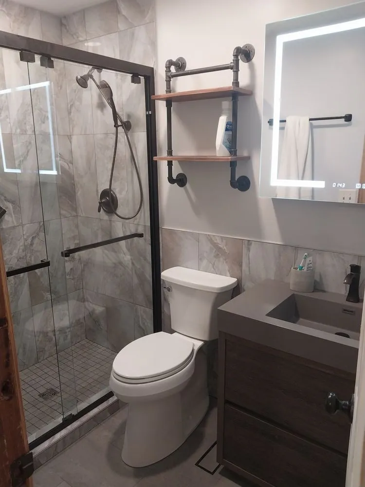 Slide of Marsh Mill Tile and Renovations