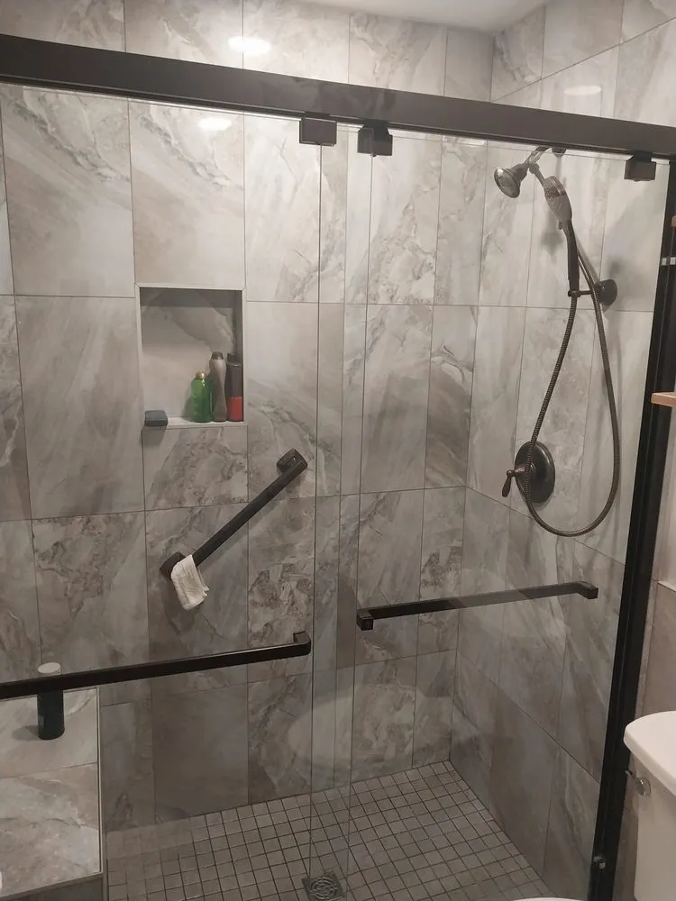 Slide of Marsh Mill Tile and Renovations