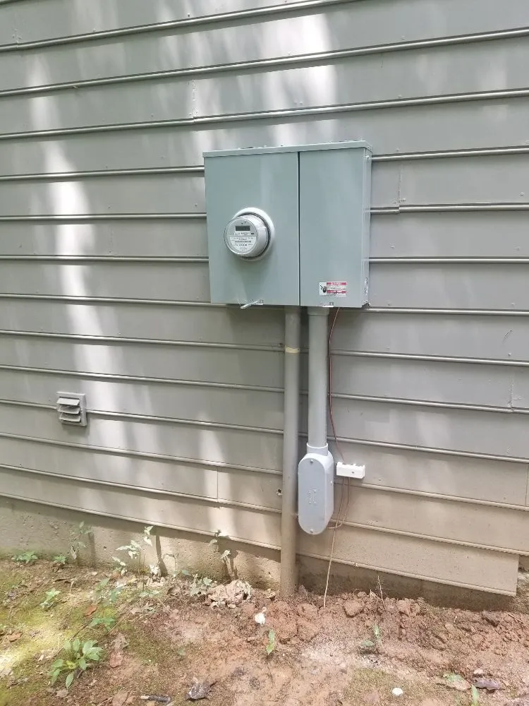Professional electrician providing outlet and switch repair in Austell, GA - Masters Generator and Electrical Service
