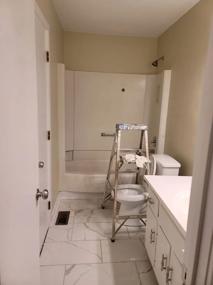 Slide of Maximum Paint & Construction