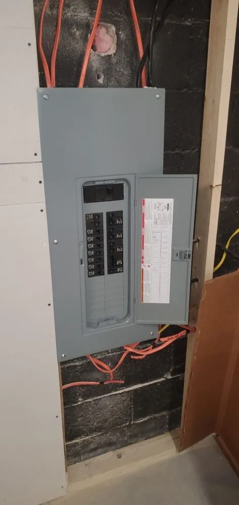 Professional electrician providing panel upgrade in , 