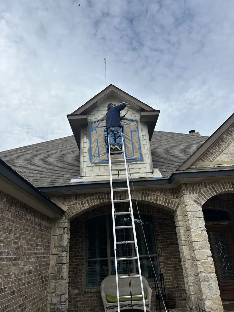 Slide of McWell’s Paint & Remodel