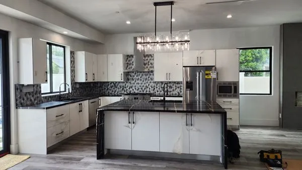 Menjivar Electric Logo