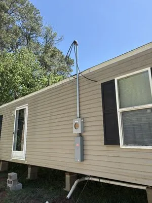 Merican Electrical Service Logo